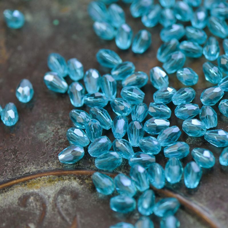 бусина "капля", граненая, стекло, цвет светло-бирюзовый радужный, 6х4 мм