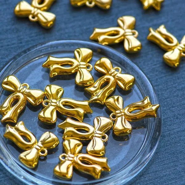 подвеска акриловая "бантик", цвет золото, 29.5x26x5.5 мм